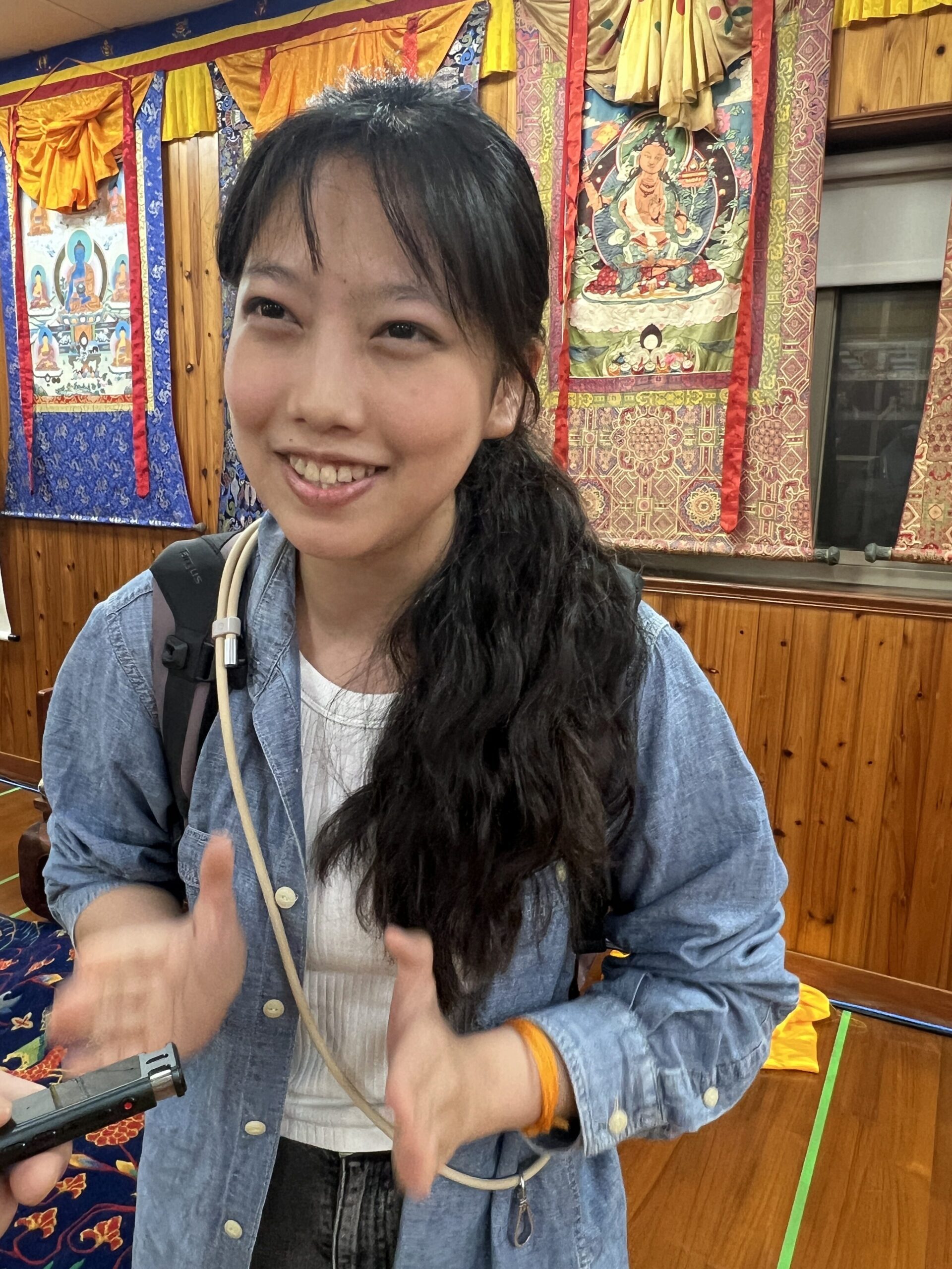 擁有甜美笑容的東華大學丁同學表示聽完演講似乎看到了人生解方/ 攝 游宏琦